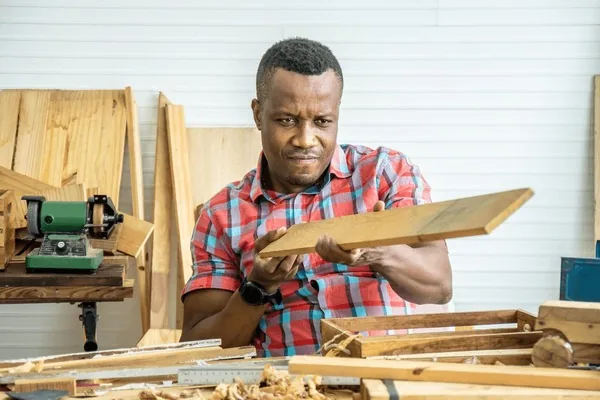 Skilled carpenter working on custom furniture in Eket, Akwa Ibom